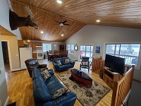 /Buck Lake Cottage Rental 31~Living and Kitchen/Dining Area